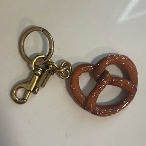 Coach pretzel charm